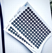 Load image into Gallery viewer, Black & White Date Dots, Mini dated round stickers for mono planner, diary or journal, 4 months per sheet, 0.5 cm each, Handmade in the UK.