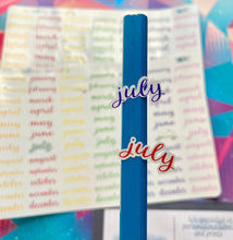Load image into Gallery viewer, Months of the Year Stickers, 29mm rainbow coloured labels, 84 cursive script planner stickers, seven lines of months, handmade in UK